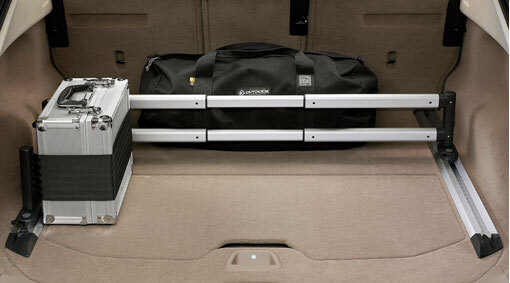 Compartimenteur de charges pour compartiment à bagages 